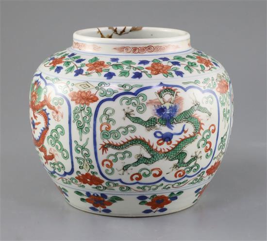 A Chinese wucai dragon jar, Qing dynasty, H. 16.5cm, repair to rim
